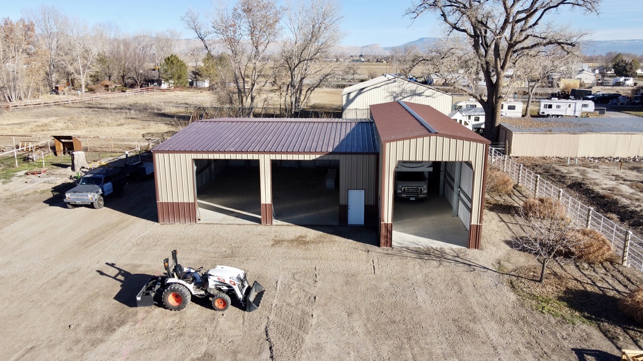 Custom 15'-6" x 60' RV Bay connected to a 50' x 40' workshop in Fruita CO
